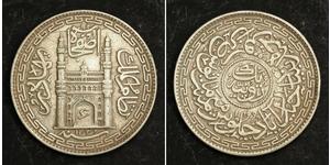  
 
   1912, India, Hyderabad, Mir Usman Ali Khan. Silver Rupee Coin. 1st date!   Reference: KM-53.  Denomination: Rupee  Mint Year: 1912 (AH 1330)  Mint Place: Haidarabad (Farkhanda Bunyad)   Ma ...