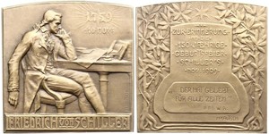 Personenmedaillen, Schiller, Friedrich vonBronzeplakette (1909) 1910, von Kautsch. Auf seinen 150. Geburtstag. Schiller sitzt an Schreibtisch / Schrifttafel zwischen Bäumen. 70 x 70 mm. Vorzüglich